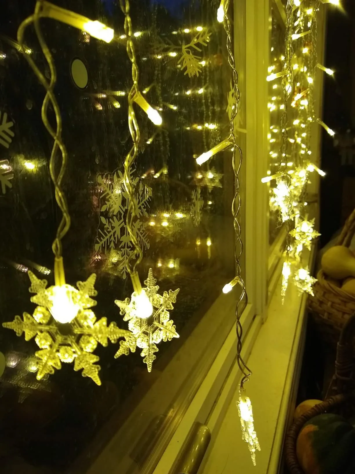 Warm Stringlights Closeup Side Angle View Glass Window Snowflake Christmas Lights