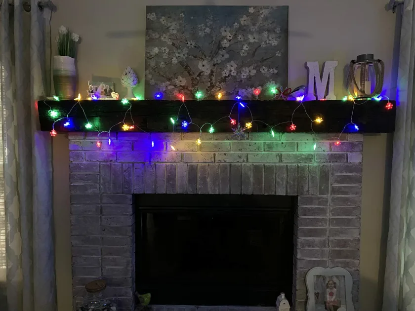 Colorful Stringlights Brick Fireplace M Angle View Snowflake Christmas Lights