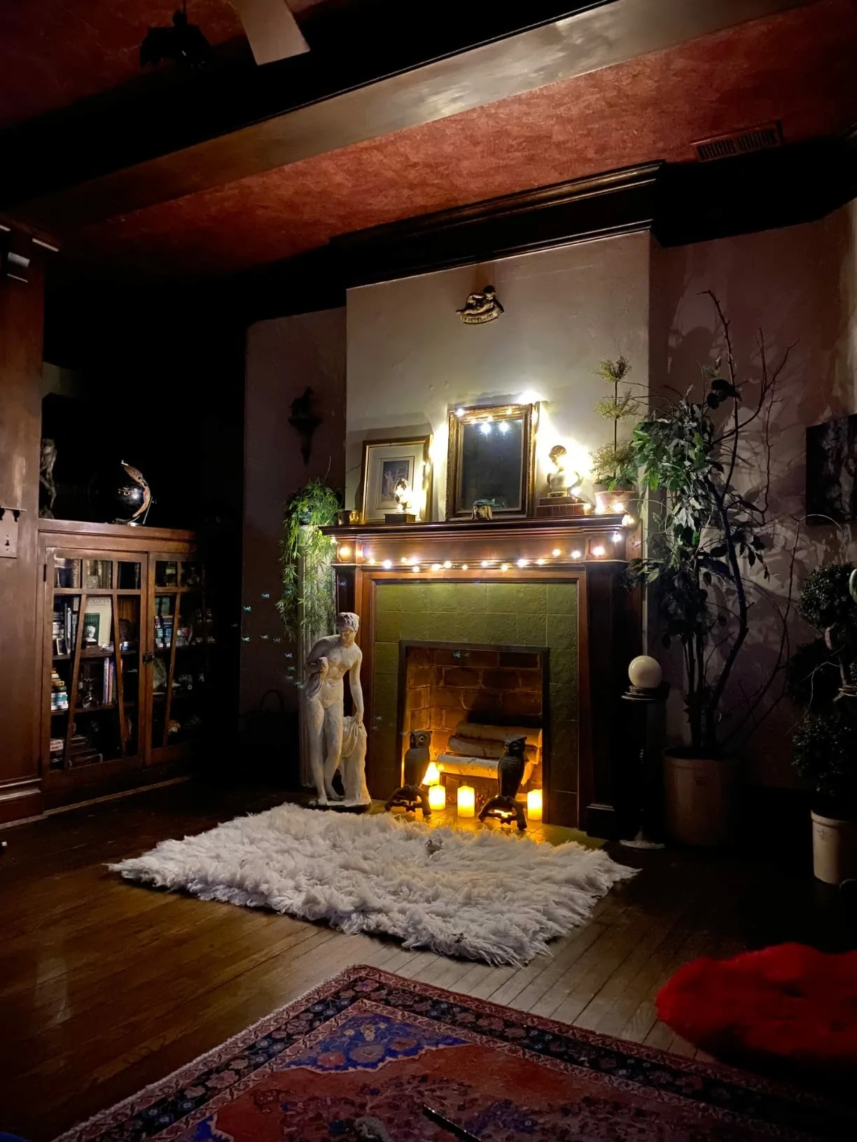 Warm Fireplace Cement Statue Wooden House Angle View Fairy Lights