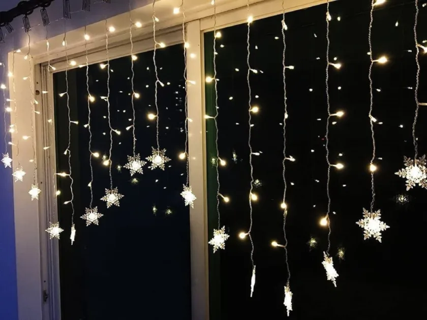 Warm Stringlights Hanging Window Night Angle View Snowflake Christmas Lights